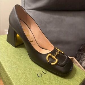 Gucci Women's Black Heels with Gold Detailing